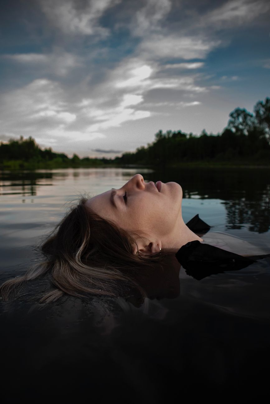 woman lying in water