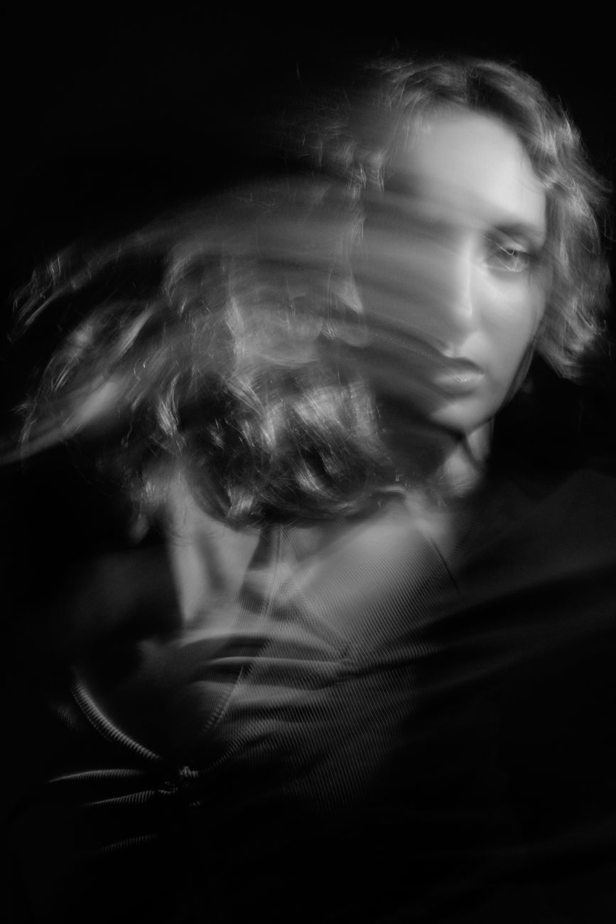 grayscale photograph of a woman